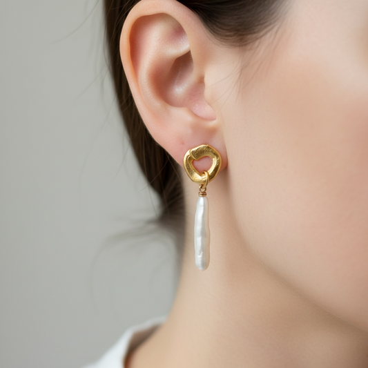 cycles with pearl drop earrings